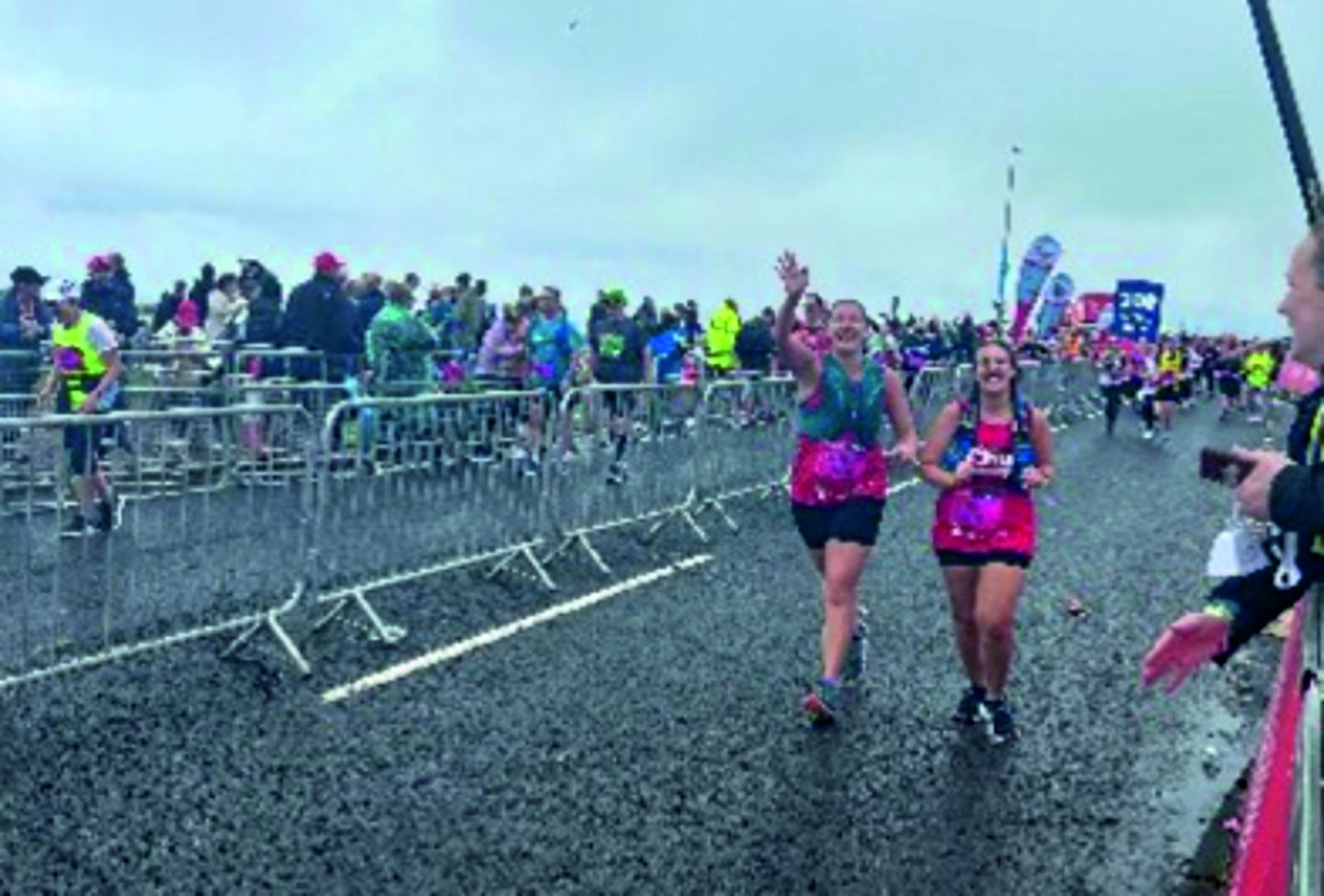 An image of two YHEC staff members running the Great North Run