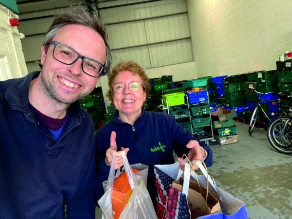 An image of a YHEC staff member dropping off our food donations to the York Foodbank warehouse