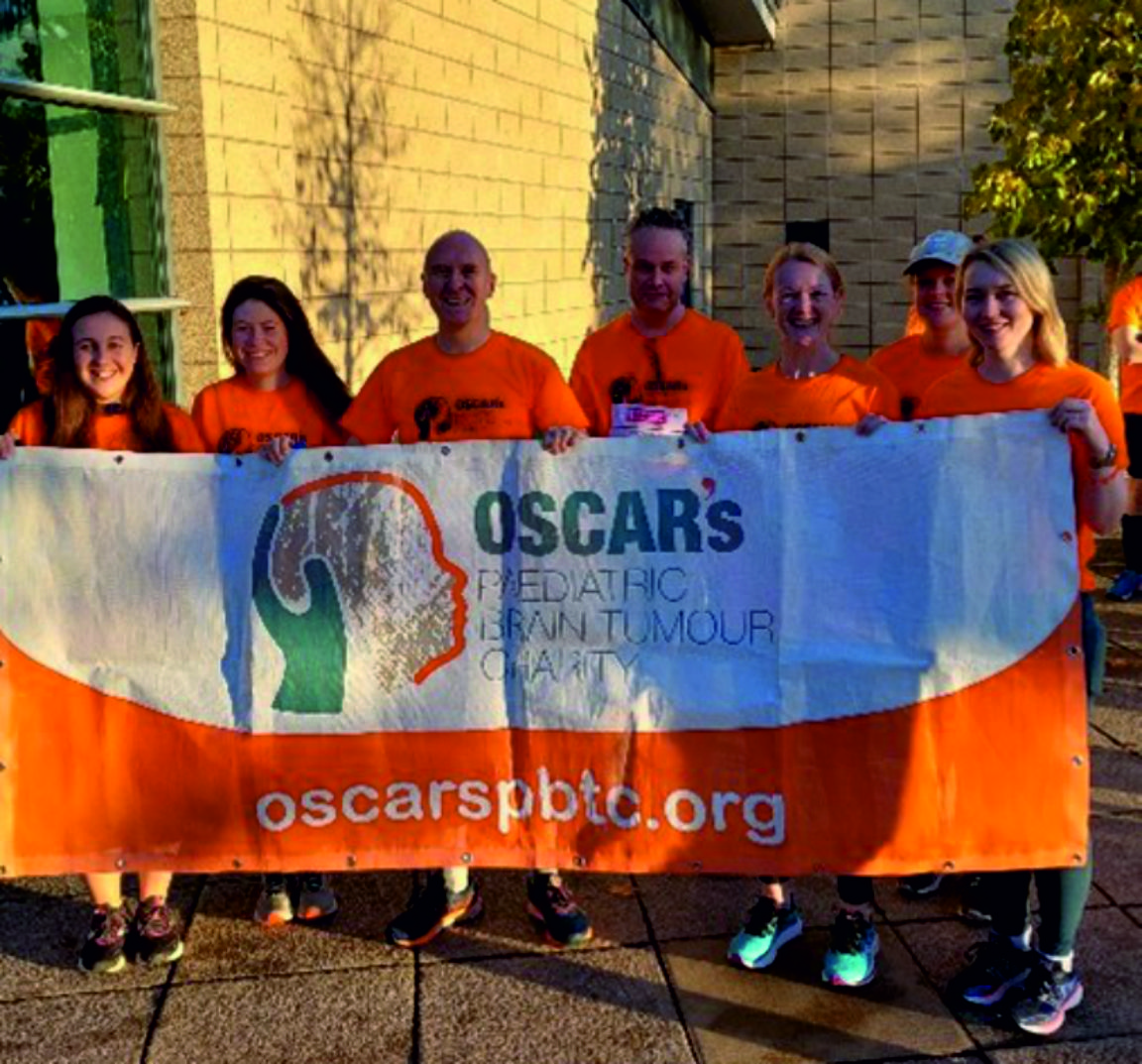 An image of seven YHEC staff who participated in a charity walk for Oscar's